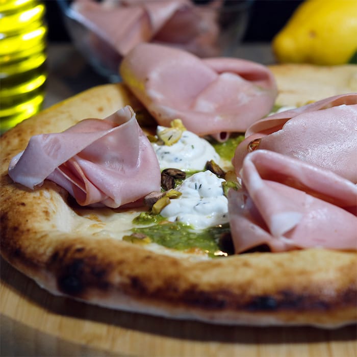 Pizza With Buffalo Ricotta, Mortadella and Pistachios